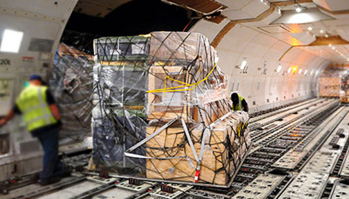 Cargo pallets securely loaded inside an aircraft